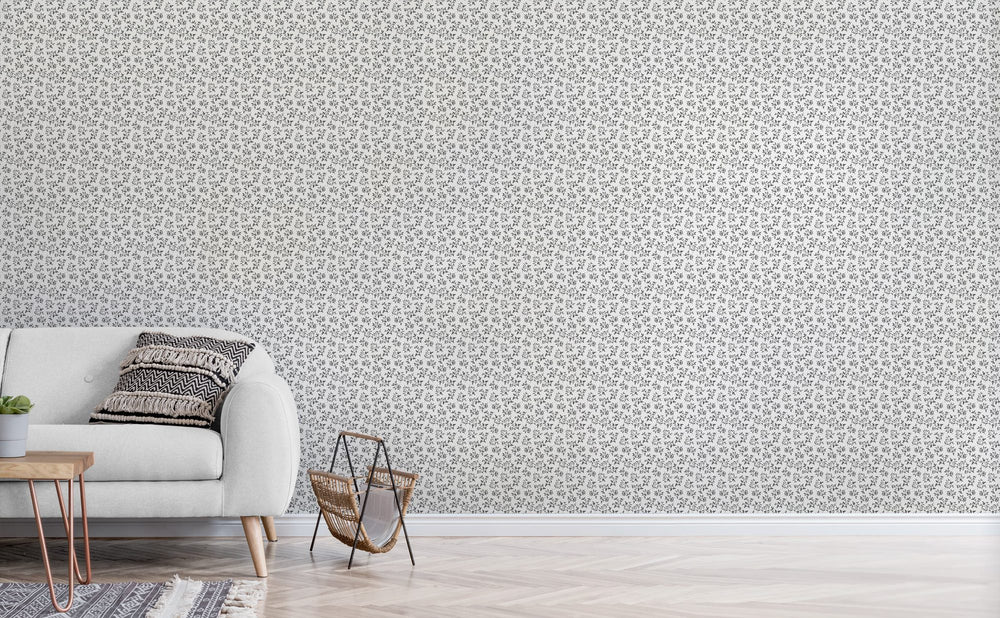 Black Leaves wallpaper in a living room | Walls Need Love