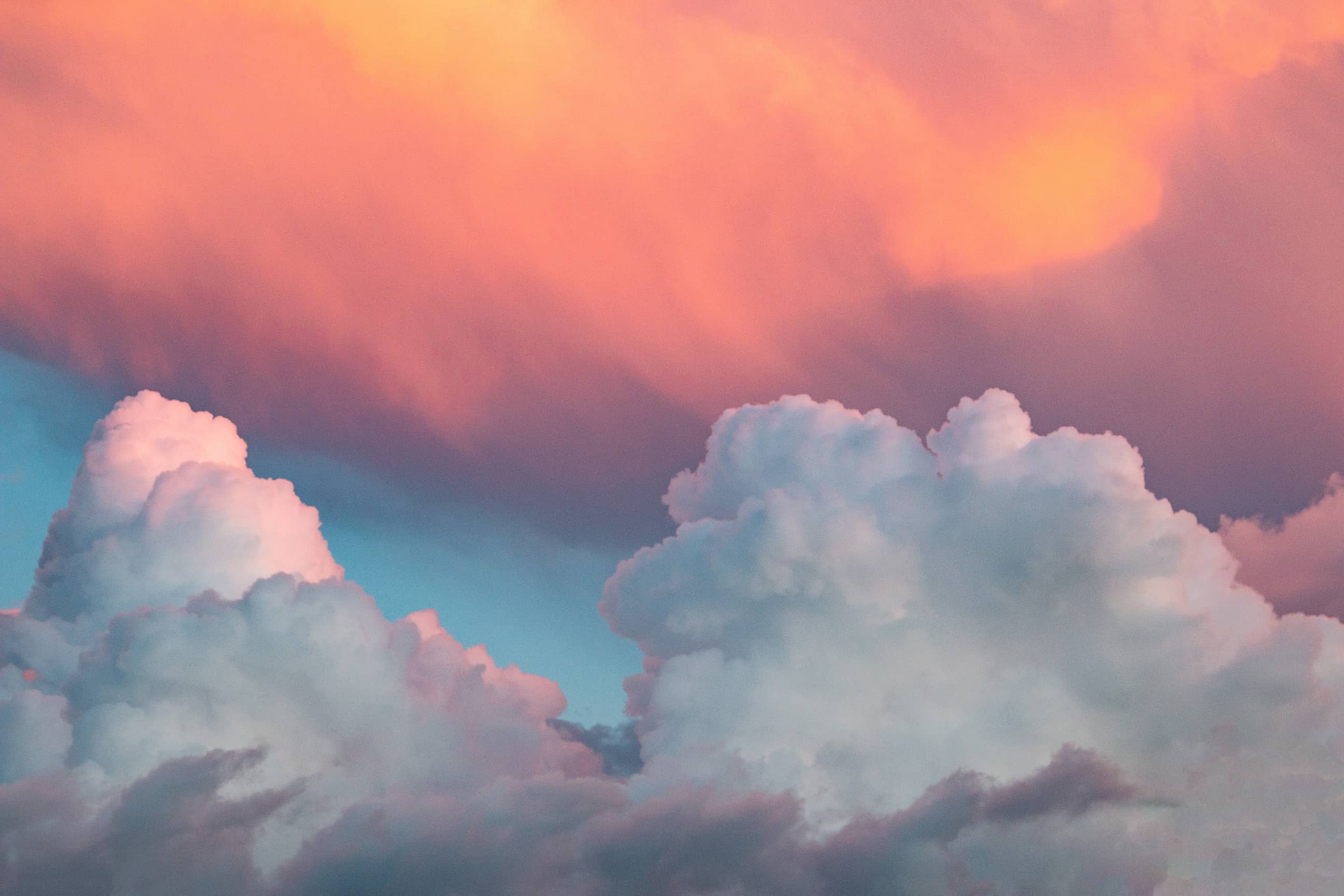 Premium Photo  Dusk in gray with orange pink and peach clouds